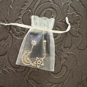 Beautiful fashion earrings- moon and star with cubic zirconias